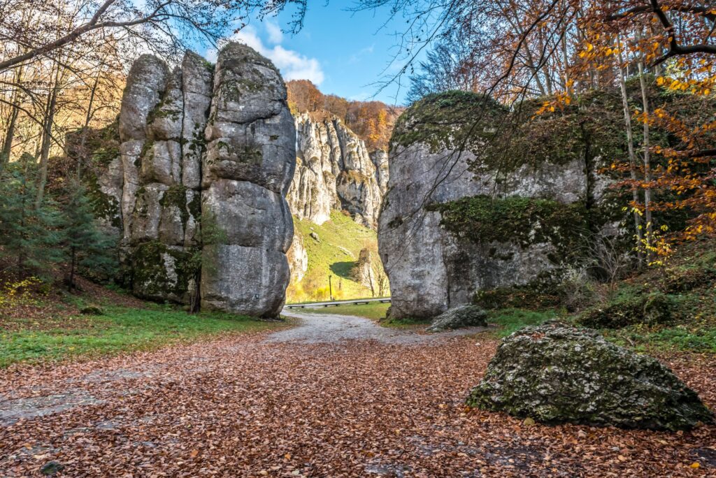 Krakow Gate rock formation in Ojcow National Park along a scenic walking path between limestone formations