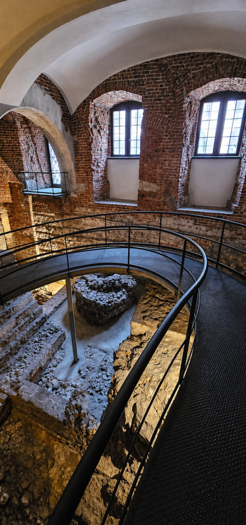 Archaeological exhibition “Wawel Lost” in Krakow showing medieval ruins and underground structures.