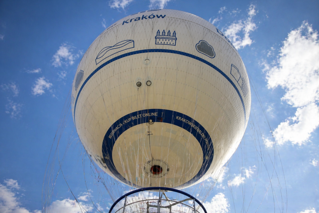 Krakow tethered balloon rising above the city skyline