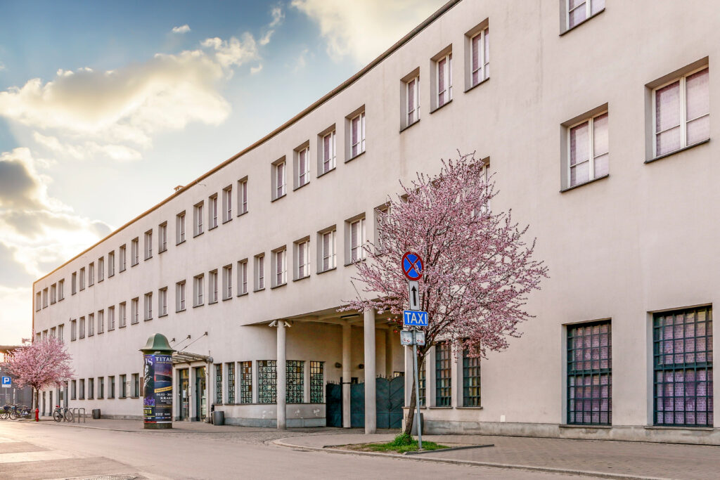 Oskar Schindler Factory Museum in Krakow seen from the front, with its historic brick façade and main entrance.